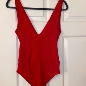 Red body suit